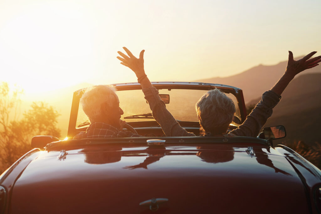 senior couple celebrating freedom on a sunset road 2026 05 21 19 44 46 utc crop web